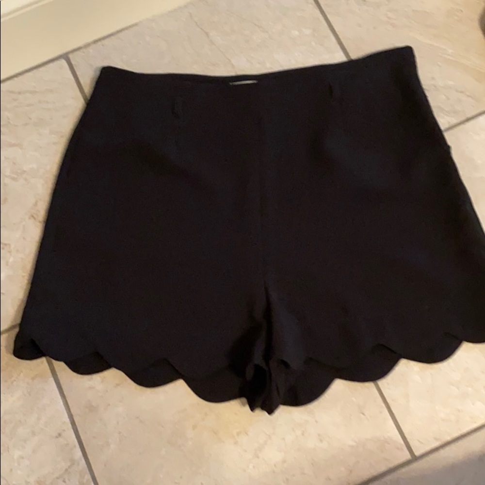 Black scalloped shorts